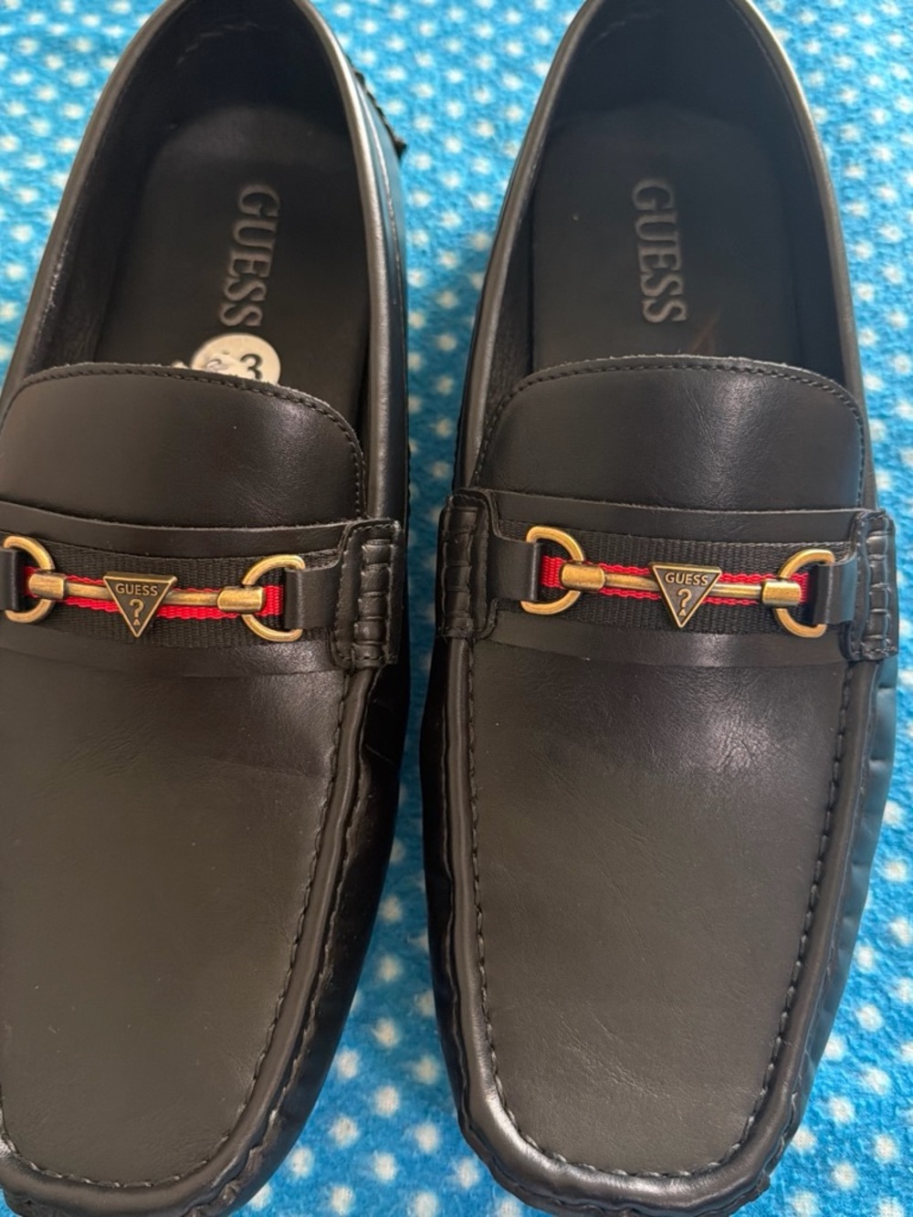 GUESS Black Leather Men’s Slip-On Loafers with Gold & Red Trim
